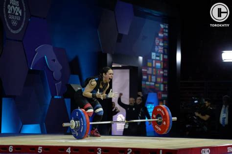 Weightlifter Celine Ludovica Delia at 55kg squatting 135kg with 